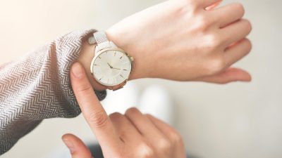 watch wrist finger time white